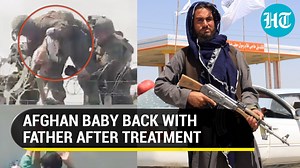 'Afghan baby lifted over wall at Kabul airport reunited with father': US Marines