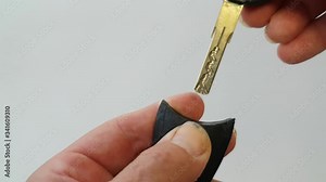 Removing emergency key blade from Saab remote fob