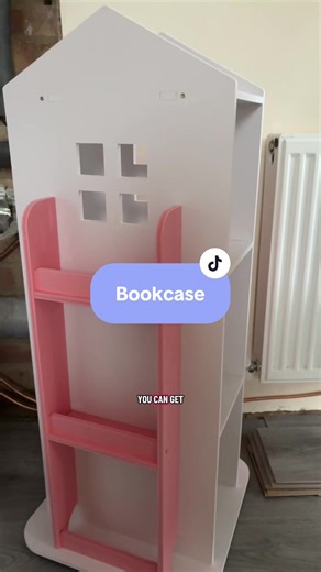 The cutest bookcase and I love the fact it spins! Now her books can be stored nicely!