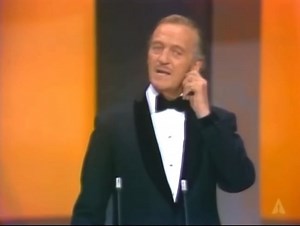 131K views · 4.9K reactions | Back in 1974, David Niven was about to introduce Elizabeth Taylor on the Oscars when he was interrupted by a long-haired, mustached nude man - better known as "The Streaker". Did anyone catch this live when it happened? Such a brilliant response from a pro.... | Vintage Los Angeles | Facebook