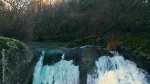 Drone footage of a gushed waterfall on the Arcos River in Fervenza Da Noveira Nature Preserve, Spain