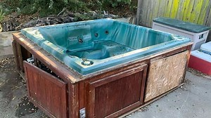 Transforming a Dirty Hot Tub: Watch Professionals Restore It to Perfection!