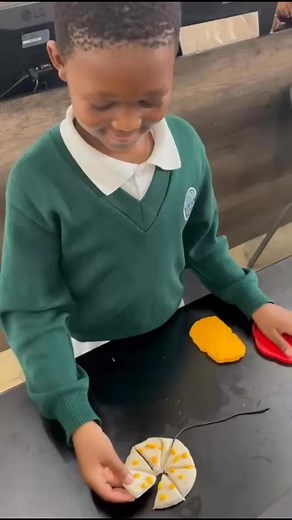 Play Dough Fractions with Mr. Mosaku! 🍕📏In Mr. Mosaku’s math class students dive into hands-on learning as they mold and slice play dough to explore fractions. A creative delicious approach to mastering math, one fraction at a time! | Maseru Preparatory School