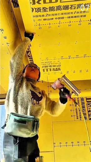 Securing printed ceiling panel using handheld power drill tool