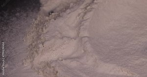 white wheat flour on the table, an ingredient for making bread and other products white wheat flour