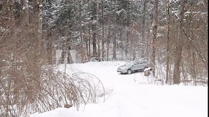 Subaru outback in the snow winter weather travel