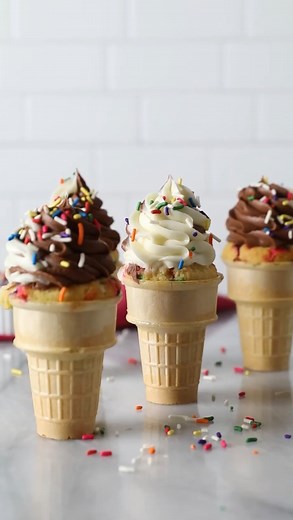 I wish I could take credit for such a cute, original idea as these ice cream cone cupcakes, but I can’t. The idea for these fun cupcakes was first introduced to me as a kid via the side of a Pillsbury box and my mom made them often. Today I’m bringing them back to life, homemade-style! We’re using my vanilla cake batter and cream cheese frosting for a soft serve ice cream look that will a make everyone do a double take! I know what you’re thinking, but please don’t be intimidated by that tall, t