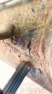 I like to use a needle scaler to remove chunky rust