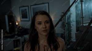 Furious woman in her home
