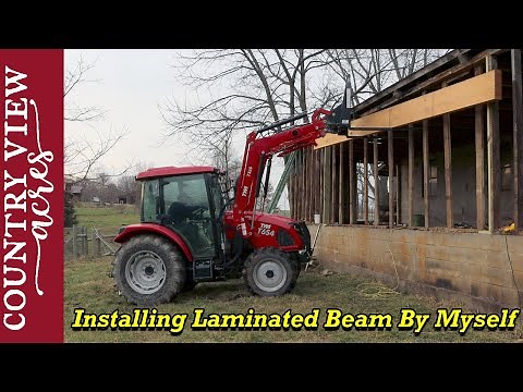Installing Laminated Beam to open up the back of the barn. It's a big job to do alone.
