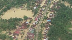 Aerials show scale of flooding in Indonesia as national disaster try to reach affected areas