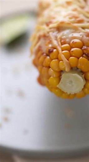 Upgrade your corn on the cob with this super easy cheesy hack! Perfect for summer BBQs or a quick weeknight side dish. Follow along for a flavor explosion! #cornonthecob #cheesycorn #summerrecipes #grilling #easyrecipe #bbq #foodhacks | Comfort Bites Recipes