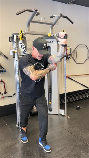 One Arm Overhead Cable Triceps Extension