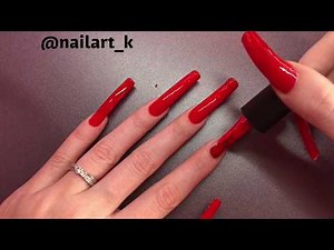 Painting my natural long nails red