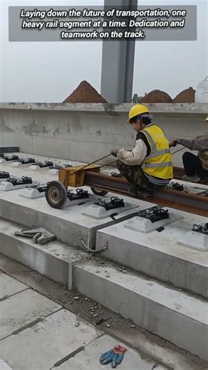 Manual Rail Installation: Building New Track on Elevated Slab Foundation