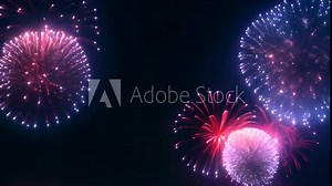 Happy New Year 4K loop of real colorful fireworks festival in the sky display at night during national holiday, new year party or celebration event. glowing fireworks show. eve fireworks. independence