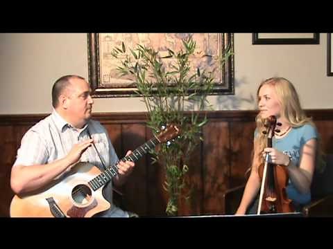 Playing violin in a worship band.