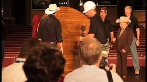 The historic circle of wood is returned to its home at the Grand Ole Opry House by Opry members Brad Paisley & Little Jimmy Dickens on August 25. The circle was rescued and refurbished after the flood of spring 2010 left the Opry stage under four feet of water. The Opry House will reopen on September 28 with an all-star lineup. Visit www.opry.com for more information. | Grand Ole Opry