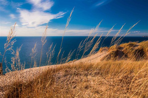 This 7.5-mile Scenic Route Is One of the Midwest's Most Beautiful Drives With Lake Views, Dune Hikes, and a Charming Coastal Town