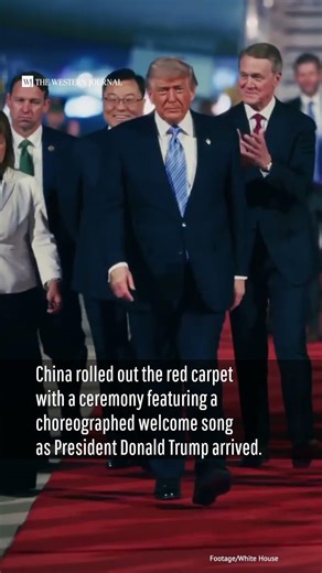 President Trump receives a highly choreographed red-carpet welcome upon arriving in China.
