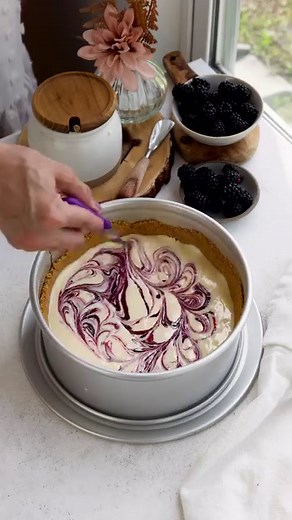 Blackberry Cheesecake a buttery graham cracker crust with a creamy cheesecake filling and tangy swirls of blackberry sauce. This cheesecake was perfectly delicious! Recipe on my website 💜 #cheesecake #cheesecakelover #cheesecakes | Pies and Tacos