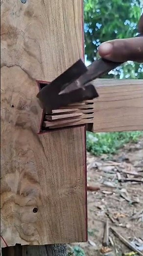 assembling and joining wooden pieces together using a hammer to create strong and durable structures