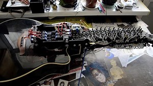 An Incredible Acoustic Guitar Self-Playing Robot