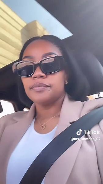 Chic Car Style: Woman in Beige Blazer and Sunglasses