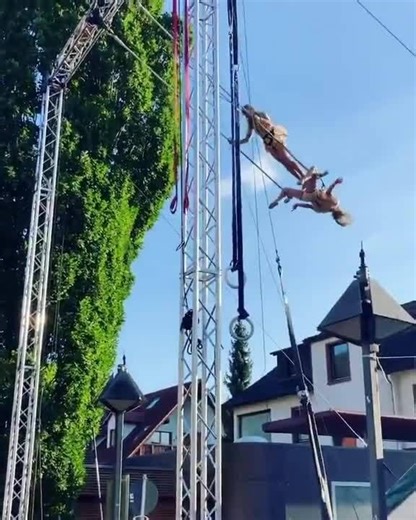 Duo Performs Incredible Trapeze Act