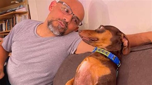 Grandparents dote on their apple-of-the-eye dog