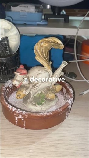 Aerial powder clay formation squirrel decor