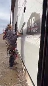 9.5K views · 1.8K reactions | Installing the wood grain metal plank siding on one of the storefronts of our current post frame strip mall build  #CinchCarpentry #QualityOverQuantity #PostFrame #Metal #Plank #Siding #Installation #Exterior #Finishing #Cladding #StoreFront #StripMall #Alberta | Cinch Carpentry | Facebook