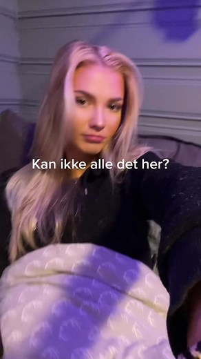 Cozy Bedroom Moments: A Young Woman's Reflection