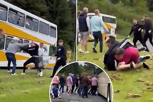 Moment Rangers and Hearts fans clash in violent brawl between supporters' buses