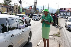 WATCH: JLP distributes ‘record achievements’ booklet in election campaign - Jamaica Observer