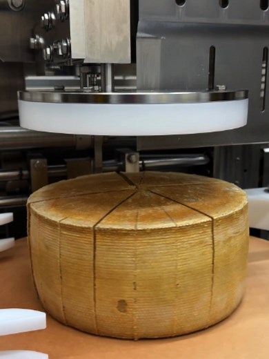 We are absolutely mesmerized by this cheese cutting machine! 🧀 As seen at La Fromagerie La Station in Compton, Quebec. #FoodNetworkFinds 📍@fromagerie_la_station