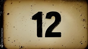 The iconic film reel countdown with a vintage filter and distressed edges.