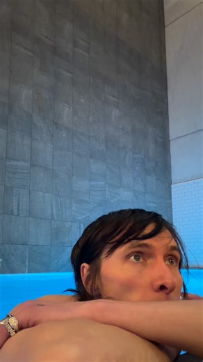 Sebastian Danzig on Instagram: "Recovering in a hotel pool because the house is still under construction and somehow still empty with no workers... Just finished a 30k run - recovering between pool and sauna. But listening to new Palaye music which I’m not supposed to talk about yet. But I am very excited for."