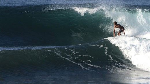 Perfect ripping conditions: Medium-size waves deliver high-performance surfing in Bali
