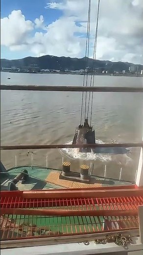 Clamshell Grab Dredger at Work in River Dredging