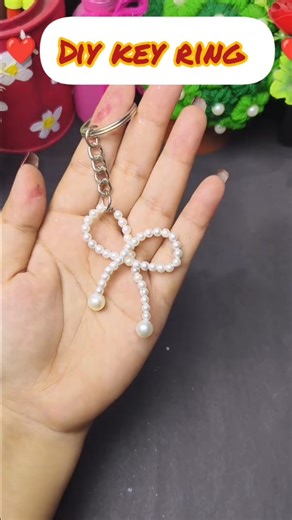 Creative Isha on Instagram: "Diy keychain 🌸✨ #diy #reels #handmade #creative #diycrafts #reelsvideoシ #explore #keycharms #keychains #diykeycharms #diykeychains #keychain #explorepage #instadaily #instareels @creative2384"