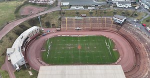 Aerial View of Rugby Stadium with Racing Track