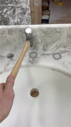 Punching out the faucet holes 🥊