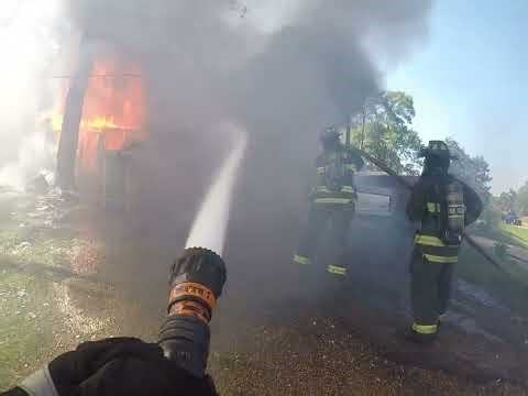 Fully involved Residential house fire with truck fire