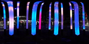 3.9K views · 86 reactions | Look up at the 'Extrude' installation near Customs House which features 16 translucent posts that sit in a dormant state... until people walk in and around it, triggering bursts of light that shoot up the columns! #VividSydney | Vivid Sydney | Facebook