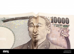 Happy smiling face on Japanese 10000 yen bill, Yukichi Fukuzawa Stock Photo - Alamy