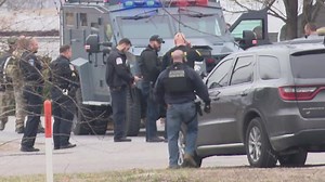 Raw scene video: Police officer shot in Dupo, Illinois, suspect still at large, police say