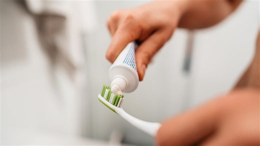 Turn empty toothpaste boxes into countertop storage that looks so chic