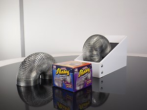 Project NESM, A Never-Ending Slinky Machine Featuring a Tiny Angled Treadmill