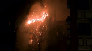 An uncontrollable fire breaks out in an high-rise skyscraper office building.